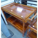 A REPRODUCTION MAHOGANY INLAID TEA TROLLEY