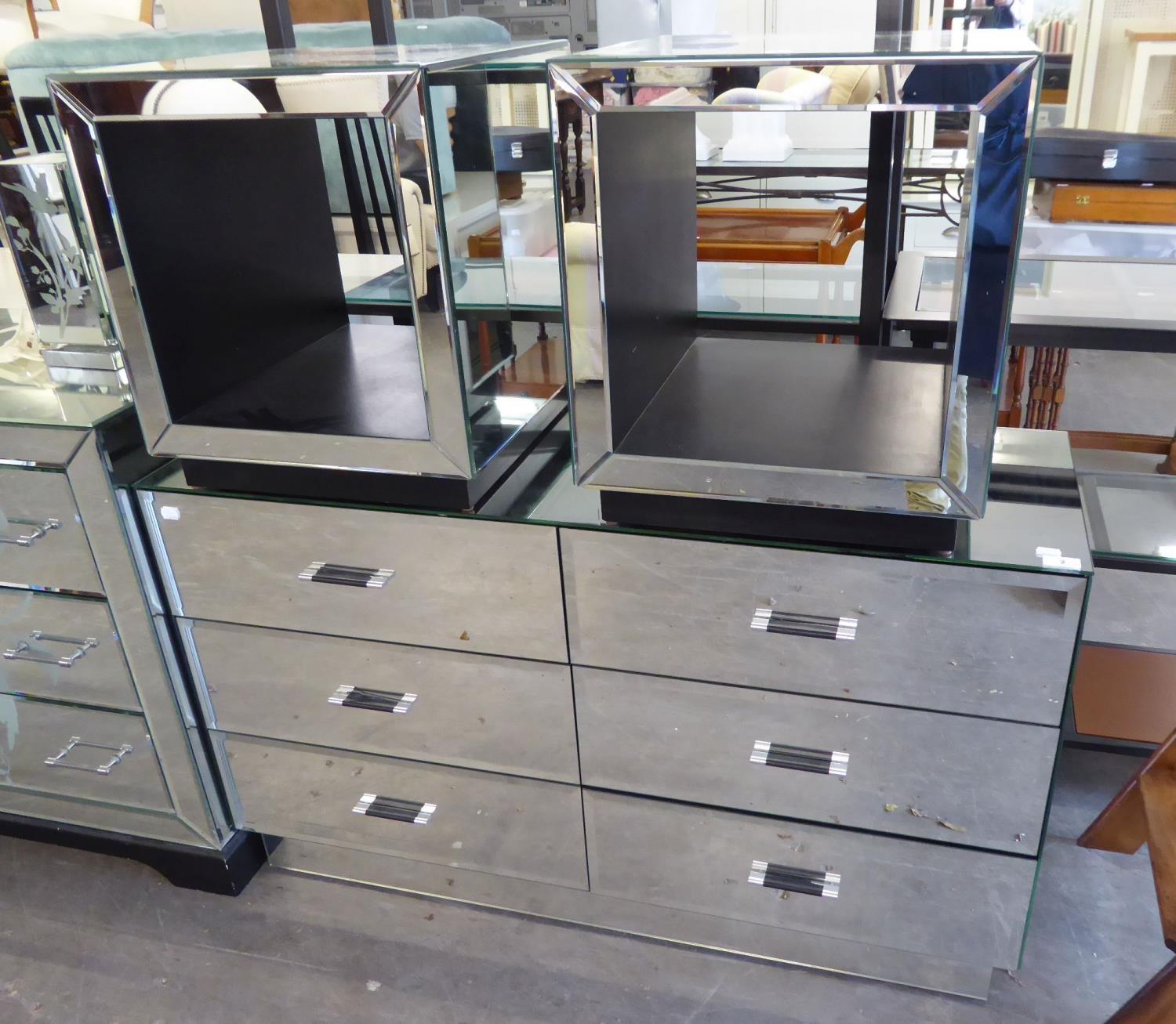 A MODERN MIRRORED SIX DRAWER CHEST (70cm high, 40cm diameter, 120cm long) AND A PAIR OF 'CUBE'