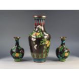 THREE MODERN ORIENTAL CLOISONNÉ VASES, all with floral decoration on a midnight blue ground, set