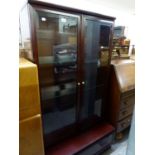 MODERN MAHOGANY EFFECT TALL DISPLAY CABINET WITH THREE GLAZED DOORS OVER AN ADVANCED BASAL DRAWER