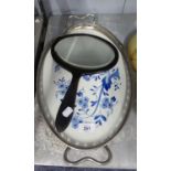 A PEWTER MOUNTED DELFT POTTERY TRAY AND A HAND MIRROR (2)