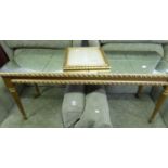 A GILT COFFEE TABLE WITH MIRROR TILED TOP AND A GILT EASEL PHOTOGRAPH FRAME