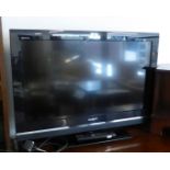 A BUSH 32" TELEVISION RECEIVER WITH REMOTE CONTROL