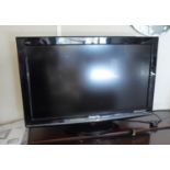 PANASONIC 31" VIERA FLAT SCREEN TELEVISION, ON MAHOGANY CORNER STAND