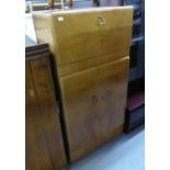 FIGURED WALNUTWOOD COCKTAIL CABINET WITH FALL FRONT AUTOMATICALLY RISING TOP AND TWO DOOR