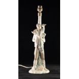 LLADRO PORCELIAN FIGURAL TABLE LAMP, modelled a s a young man carrying a young goat across his