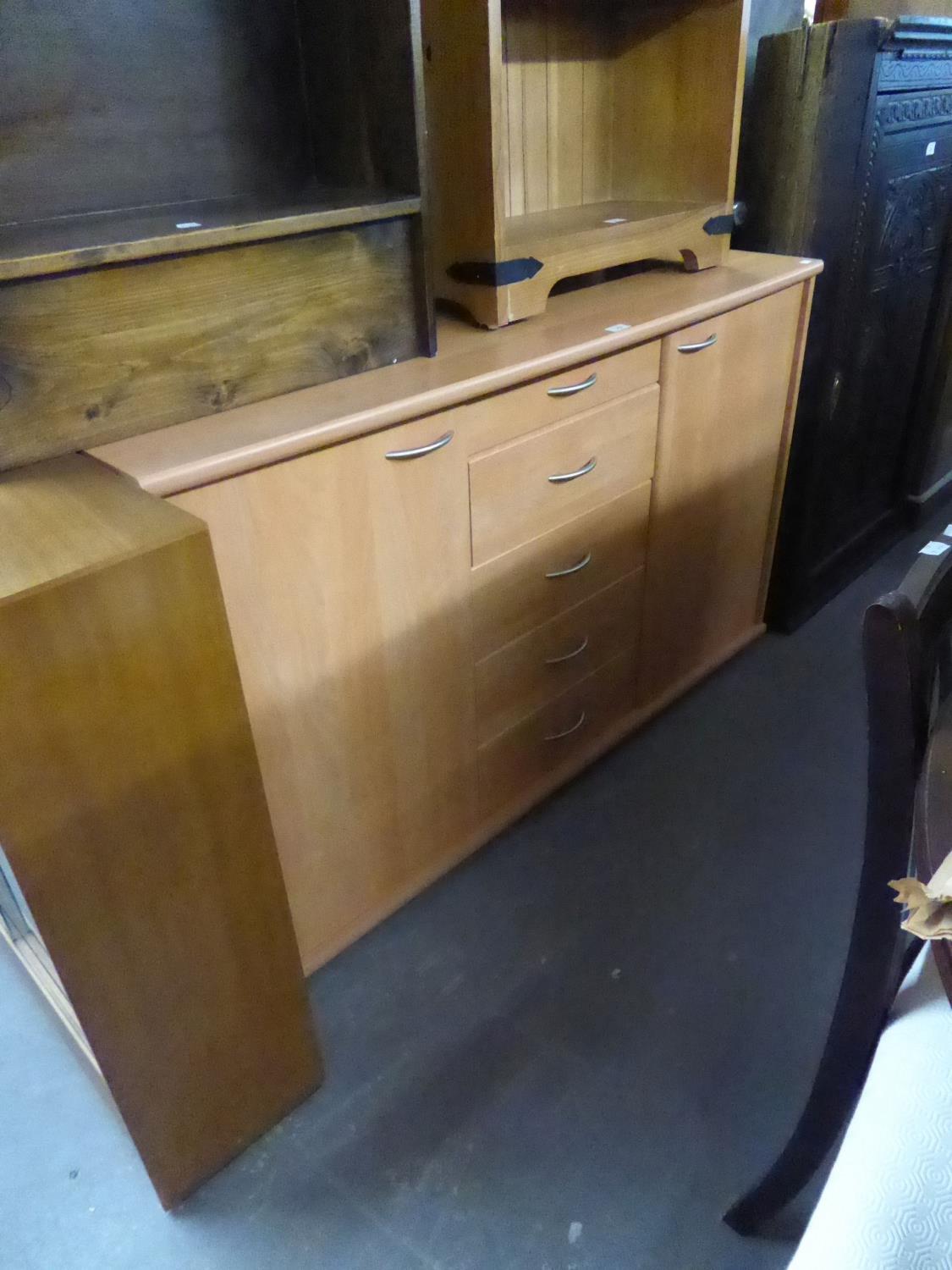 MODERN LIGHTWOOD SIDEBOARD HAVING FIVE CENTRAL DRAWERS BETWEEN CUPBOARD DOORS, CHROME HANDLES