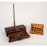 SET OF VICTORIAN MAHOGANY CASED BRASS AND STEEL COLLAPSIBLE GOLD SCALES and a WOODEN CASED SET OF