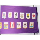 A LONG PURPLE FABRIC SHEET, applied with approx 40 Lions Club pennants