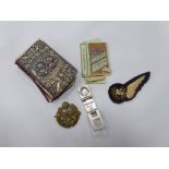POCKET SIZED HYMN BOOK WITH EMBOSSED SILVER COVER, together with an R.A.F. BADGE, FIELD MAGNIFIER