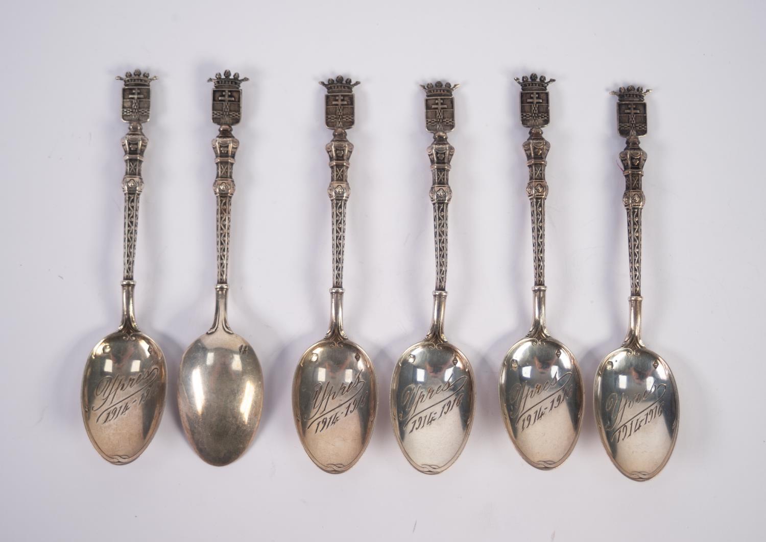 SET OF SIX FRENCH EARLY 20th CENTURY GOTHIC PATTERN SILVER COFFEE SPOONS, with town crest finial,