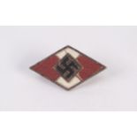 HITLER YOUTH WHITE METAL AND ENAMEL LAPEL BADGE of triangular form with wire pin the back marked