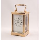 LATE 20th CENTURY ENGLISH CORNICHE CASED BRASS CARRIAGE CLOCK, the white enamel dial marked 'John