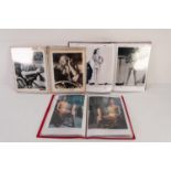 THREE ALBUMS CONTAINING A COLLECTION OF BETTY GRABLE BLACK AND WHITE STILLS, COLOUR AND BLACK AND