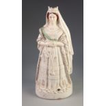 EARLY VICTORIAN STAFFORDSHIRE POTTERY STANDING FIGURE OF A YOUNG VICTORIA, hands clasped at her