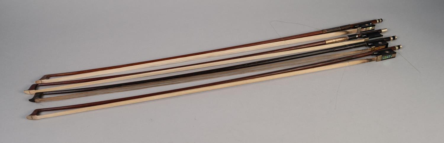 VIOLIN BOW STAMPED TECHLER with wire bound stick and THREE OTHER BOWS, one stamped Homa