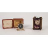 SMITH DE LUXE JEAN LARIVE" GILT CASED MINIATURE TRAVEL CLOCK with perspex front and back visible