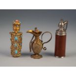 EARLY 20th CENTURY MOULDED GLASS CYLINDRICAL SCENT BOTTLE, clad in gilt metal filigree with hinged