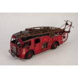 POST WAR PAINTED TIN PLATE MODEL OF A BRITISH RED FIRE ENGINE with rear mounted ladder trolley top