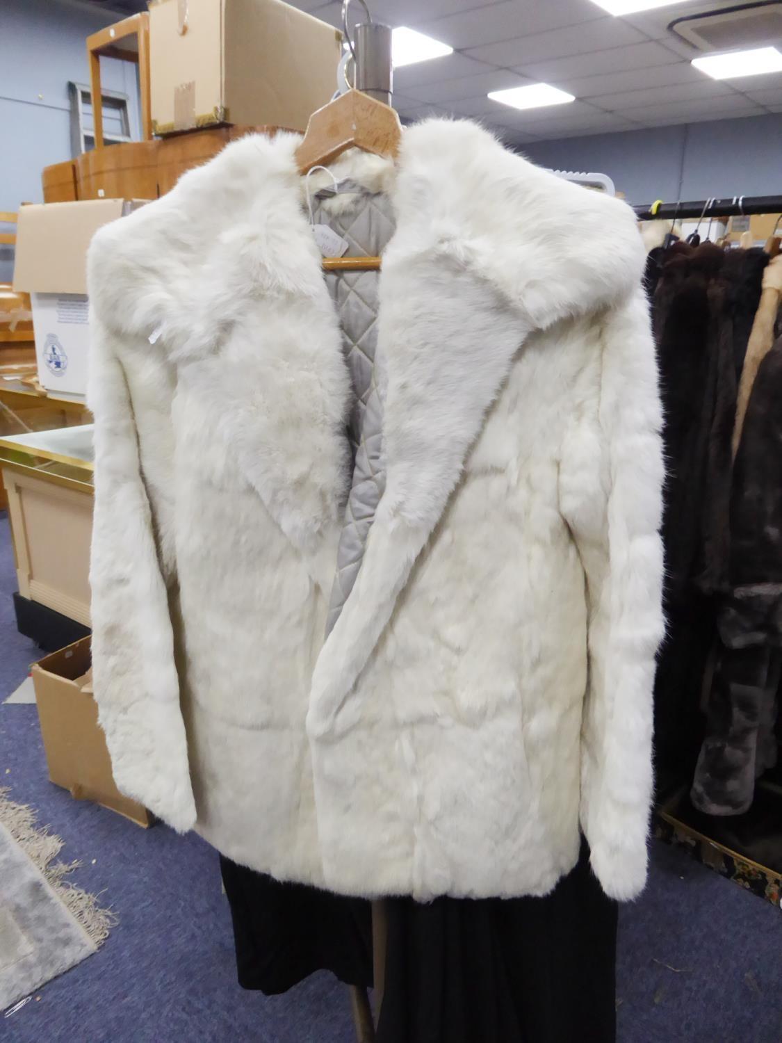 FOUR LADIES RABBIT FUR JACKETS TO INCLUDE: light brown, black, white and a grey example and a 3/4