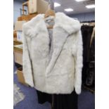 FOUR LADIES RABBIT FUR JACKETS TO INCLUDE: light brown, black, white and a grey example and a 3/4