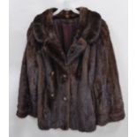 DARK BROWN MINK JACKET with revere collar, double breasted front with four brass decorative buttons,