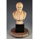 LATE 19th/EARLY 20th CENTURY WHITE COMPOSITION BUST OF WELLINGTON, depicted in open greatcoat, on