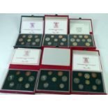 ROYAL MINT ISSUED COMMEMORATIVE COIN SETS 1984-1989, in original boxes unused (6)