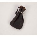A SMALL LEATHER POUCH WITH METAL RING CLOSES 4 1/2" LONG