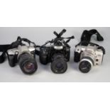 THREE MINOLTA 35mm SLR ROLL FILM CAMERAS, comprising: 404 si, with 35-80mm, f:4-5.6 AF ZOOM LENS,