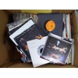 SINGLE VINYLS A selection of approximately 250 45 rpm singles. An eclectic mixture of genre and