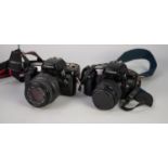 TWO CANON EOS 1000F SLR ROLL FILM CAMERAS, one with SIGMA 70-210mm, f:4-5.6 AF ZOOM LENS, the