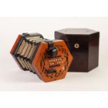 LACHENEL AND CO., LONDON, LATE NINETEENTH CENTURY CONCERTINA, of hexagonal form, with fret pierced