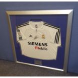 ZINEDINE ZIDANE SIGNED REAL MADRID REPLICA FOOTBALL SHIRT, mounted, framed and glazed, supplied with