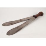 TWO MARTINDALE MACHETES WITH HARDWOOD HANDLES, 24 ½? and 25? (62.2cm and 63.5cm) long overall,
