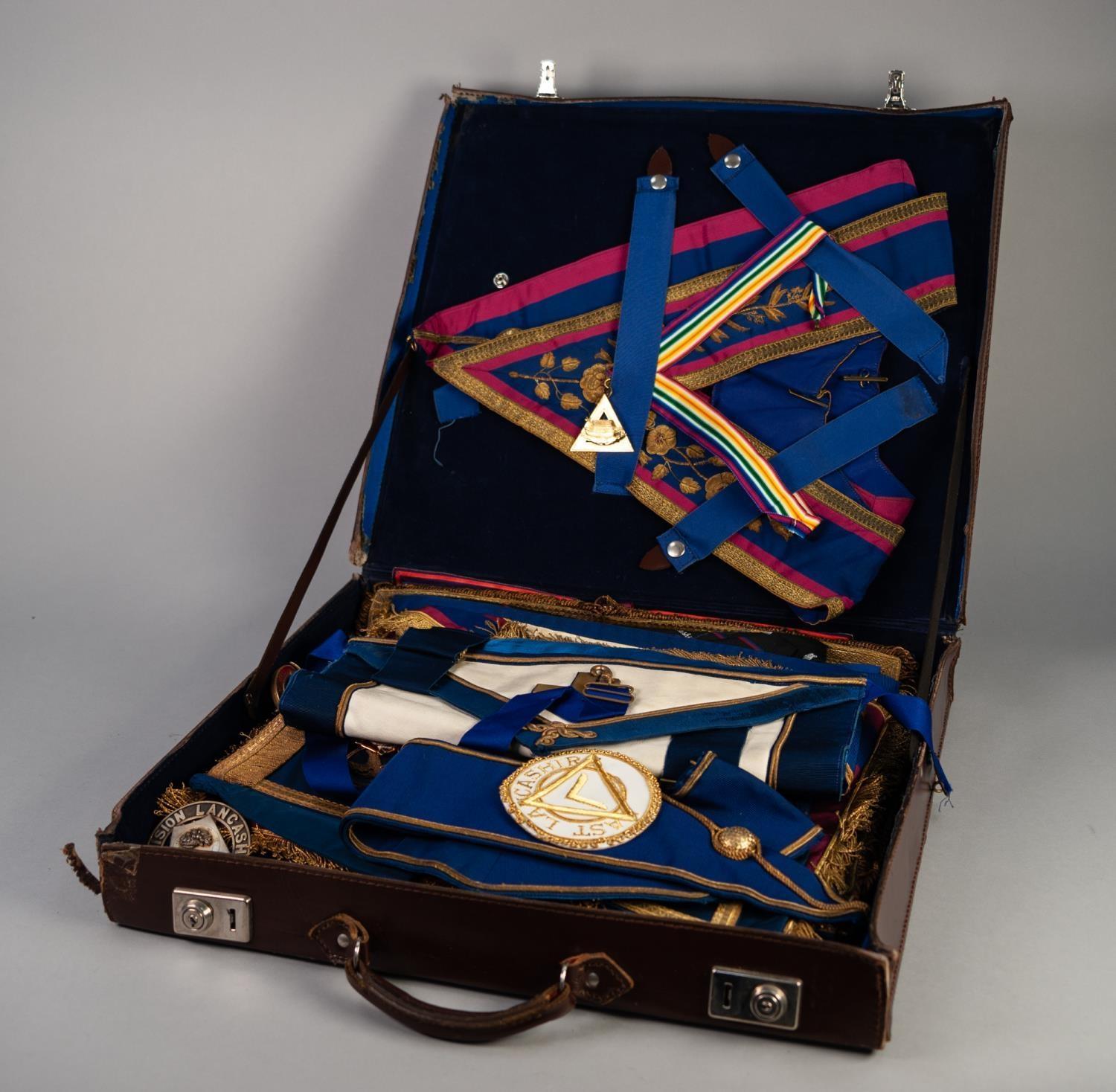 LEATHER CASE CONTAINING A SET OF MASONIC REGALIA FOR THE 'EAST LANCASHIRE' LODGE with embossed