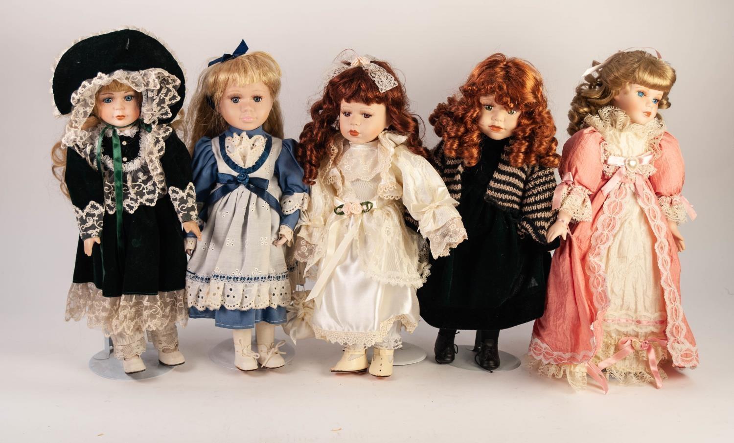 GROUP OF ELEVEN MODERN DOLLS, all having porcelain head and limbs, all on stands, all female in