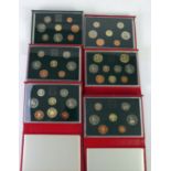 ROYAL MINT ISSUED COMMEMORATIVE COIN SETS 1984-1989, in original boxes unused (6)