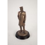 MODERN DETAILED BRONZED COMPOSITION STANDING FIGURE OF GEORGE V IN MILITARY UNIFORM, stamped PCS