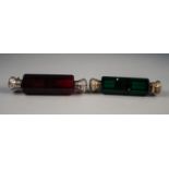 VICTORIAN PANEL CUT RUBY GLASS DOUBLE ENDED SCENT BOTTLE with embossed white metal hinge and crew