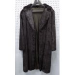 'SAGA MINK', FULL LENGTH DARK MINK FUR COAT, with revere collar, hook fastening and slit pockets, as