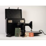POST-WAR CASED ELECTRIC SINGER PORTABLE SEWING MACHINE, no 221K