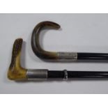 EBONISED WALKING STICK with white metal mount and antler bone handle and ANOTHER with silver
