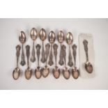 THIRTEEN 'BIRKS' EARLY 20th CENTURY ELECTROPLATE COMMEMORATIVE TEASPOONS each cast with image of a