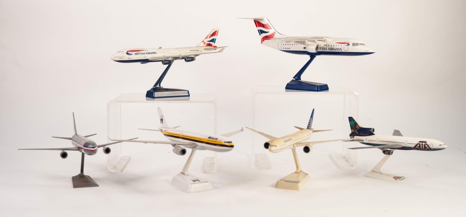 FOURTEEN PLASTIC MODELS OF PASSENGER AIRCRAFT, VARIOUS SCALES, EACH ON DISPLAY STAND and, mainly