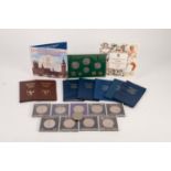 TWO BROWN PLASTIC WALLET each containing six Isle of Man decimal coins, also FIVE IDENTICAL BLUE