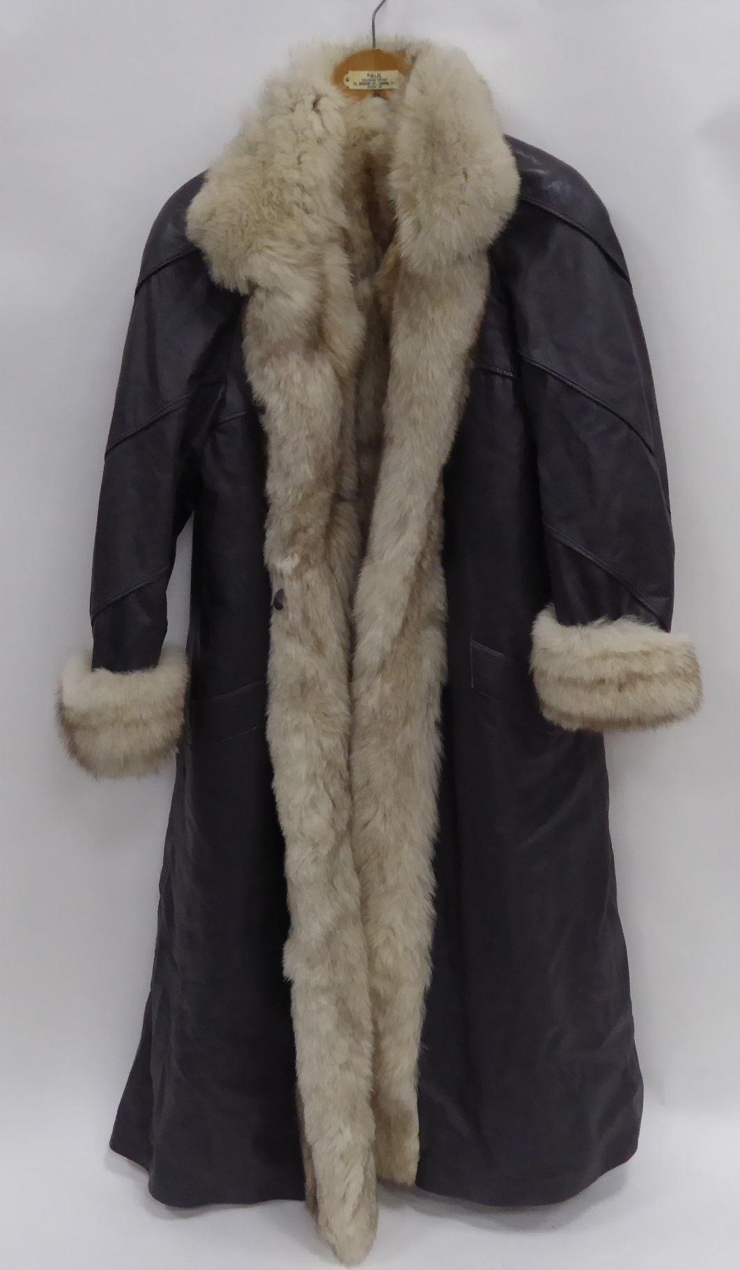 *LADIES FULL LENGTH BLACK LEATHER AND FOX FUR TRIMMED AND LINED COAT AND SUNDRY ITEMS OF CLOTHING