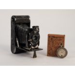 BUSCH BELLOWS FOLDING VEST POCKET CAMERA of traditional form with black morocco clad body anda boxed