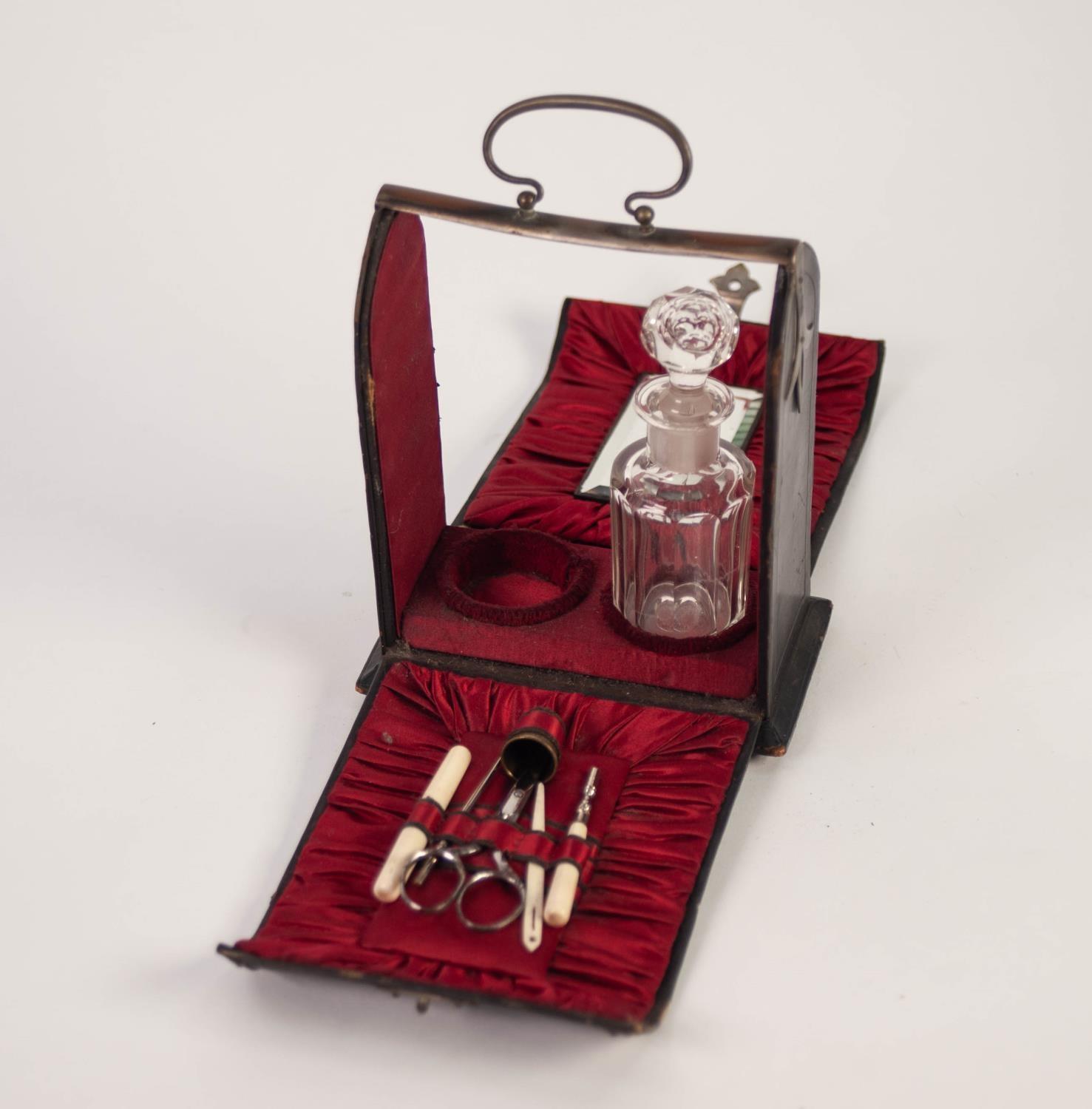 CIRCA 1900 BLACK MOROCCO VANITY CASE with front and back opening red and pleated silk lining, fitted - Image 2 of 2