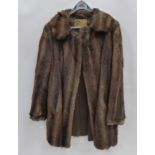 MUSQUASH THREE QUARTER LENGTH FUR COAT and a MINK STOLE (2)